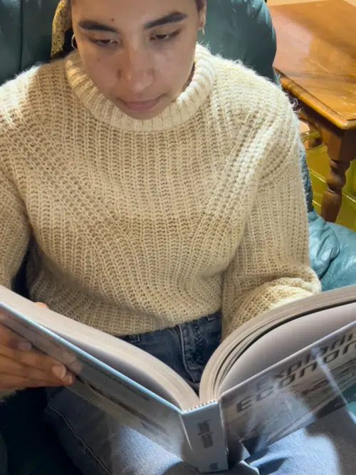 girl studying text book