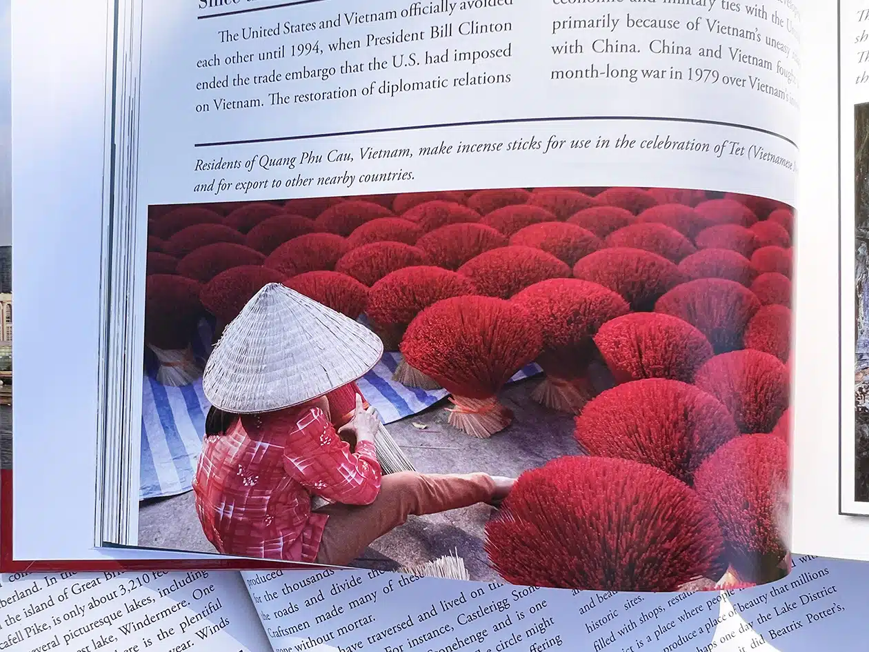 image in textbook of a Vietnam resident making incense sticks
