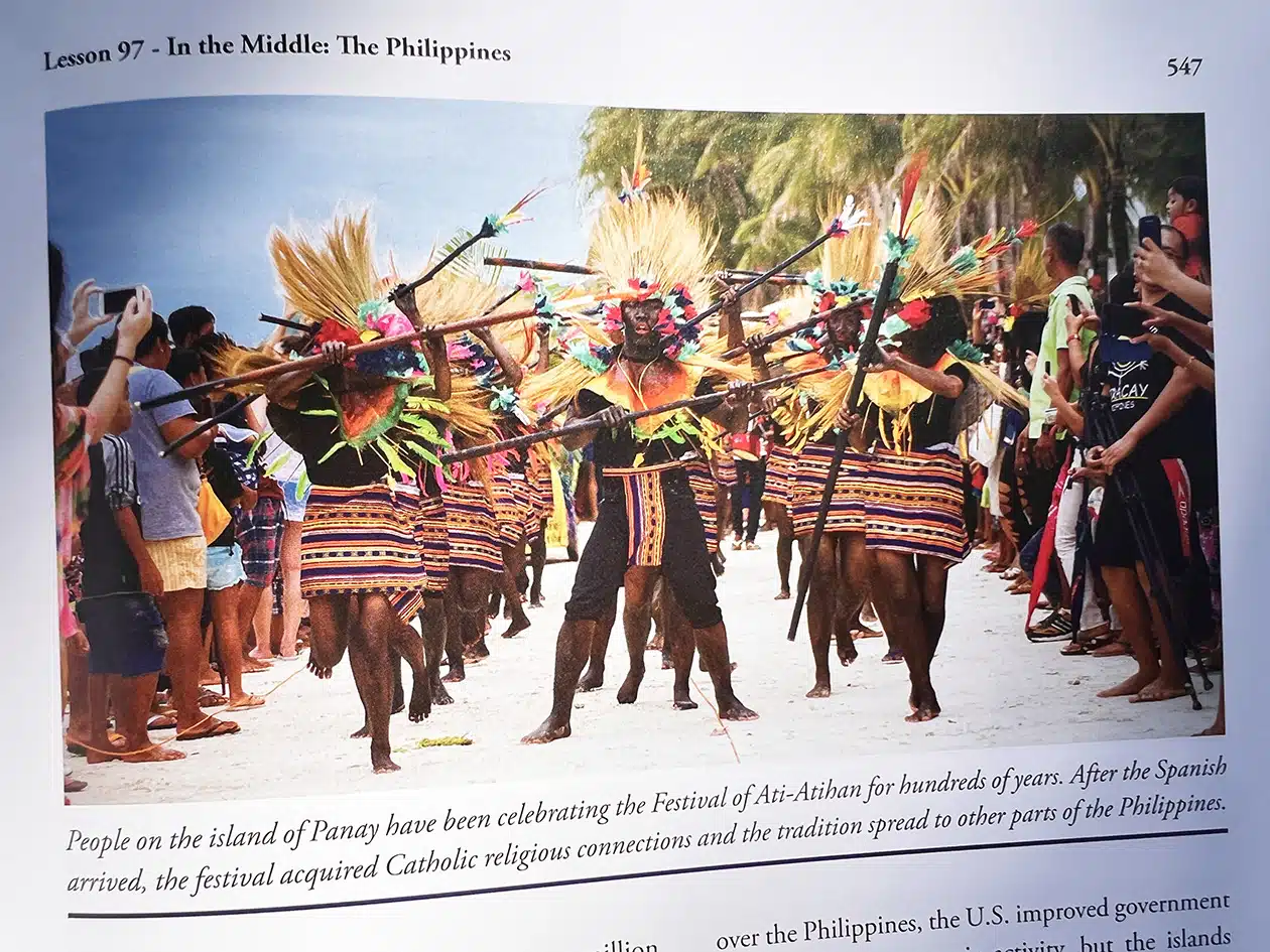 image in textbook of natives celebrating the Festival of Ati-Atihan